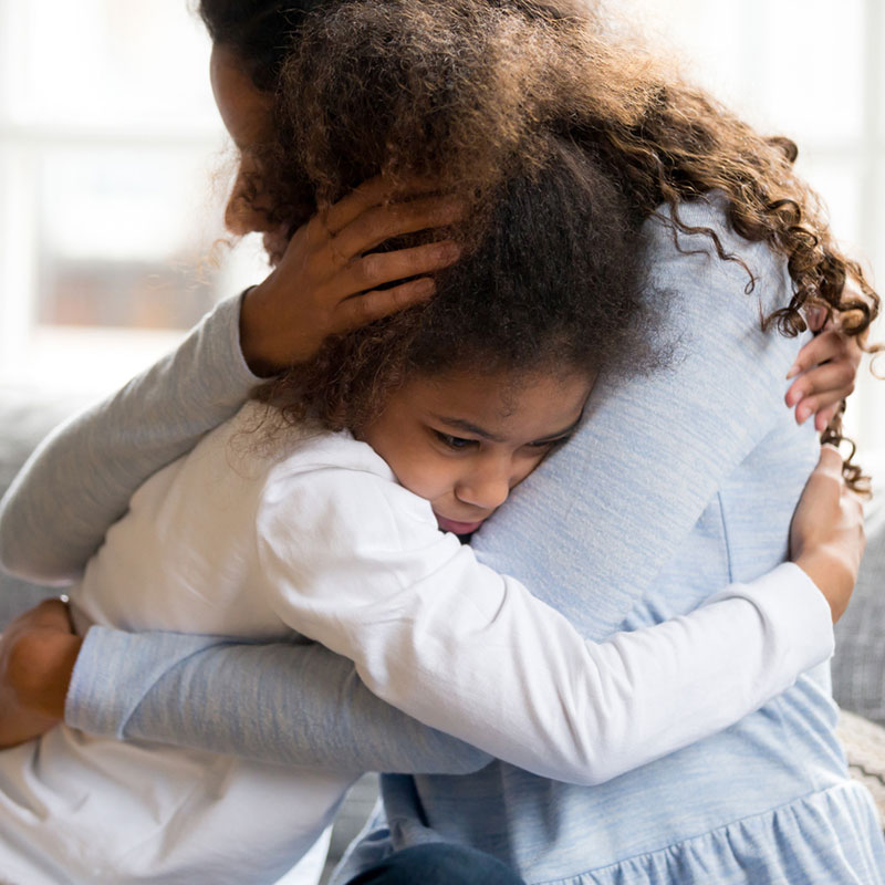 SPACE Program at Mirjam Quinn & Associates, young child hugging her mother tightly