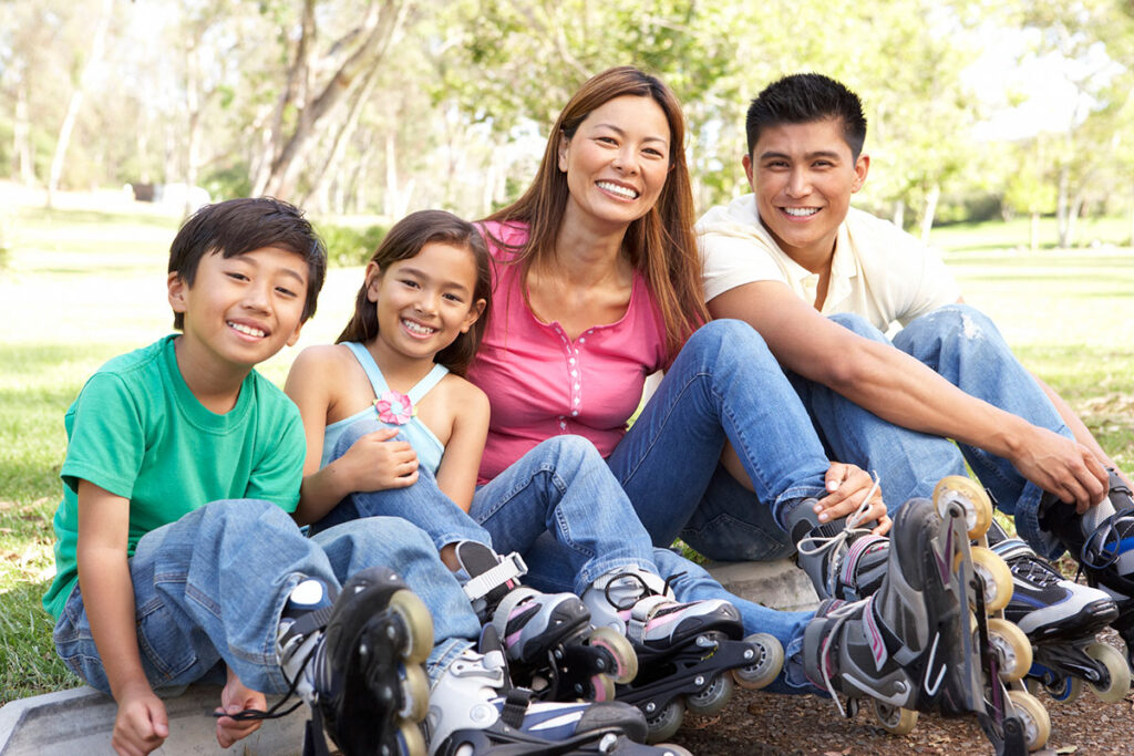 Support your child's back-to-school transition with these effective strategies, family outside on rollerblades